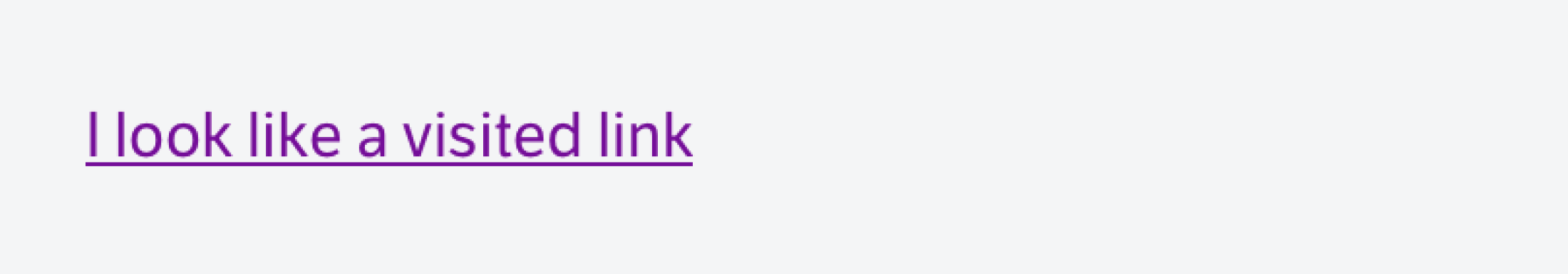 Purple text "I look like a visited link" with an underline, resembling the style of a hyperlink in its visited state.