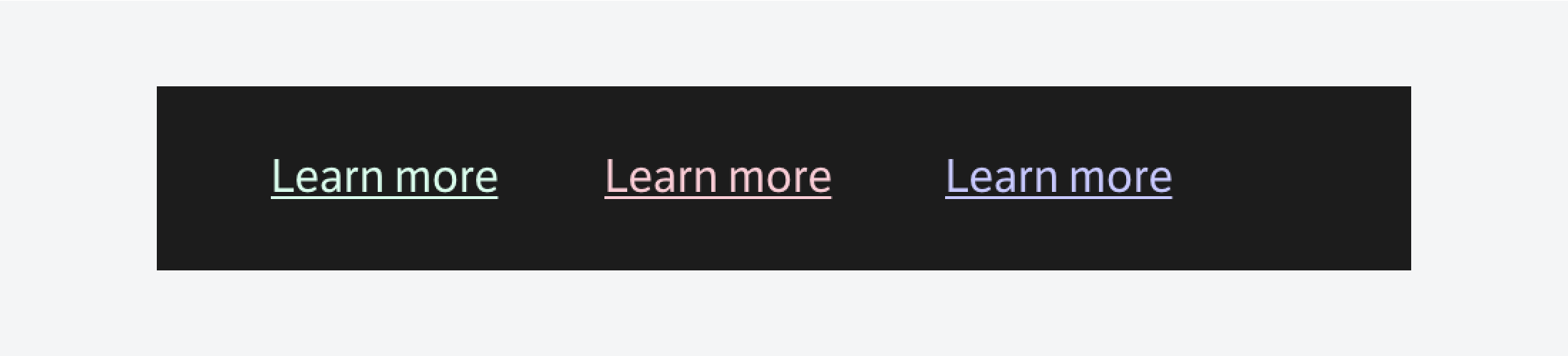 Three "Learn more" links displayed in pastel green, pink, and blue colors, each underlined, set against a black background.